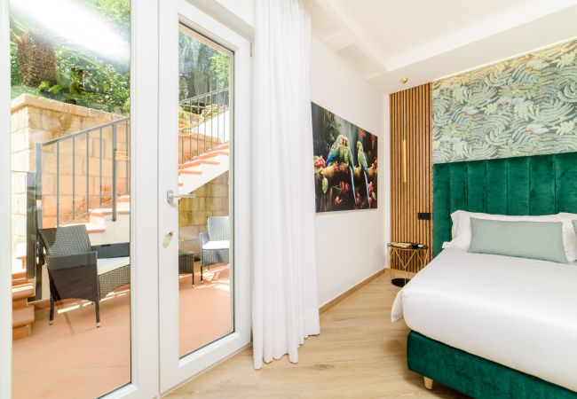 Affitto per camere a Piano di Sorrento - NicholHouse - Green Parrot Affitto per camere a Piano di Sorrento - NicholHouse - Green Parrot